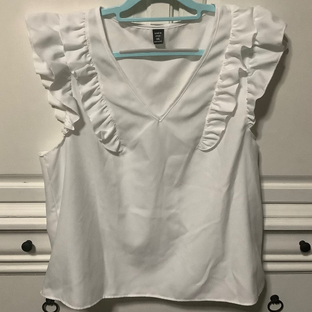 Ladies 1X white ruffled sleeve deep v neck top with extra ruffles on front